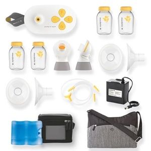 Medela double electric breast pump with accessories.